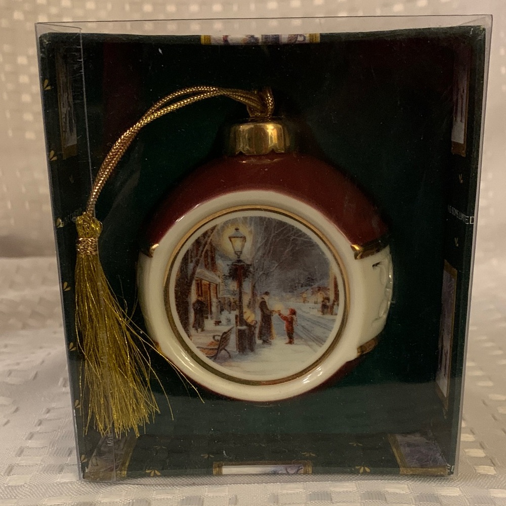 Elegant Trisha Romance porcelain Holiday ornament with Gold Tassel, from 2003.